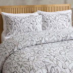 Parure de lit Astrid 100 % coton (housse de couette et taie d'oreiller) - Blanc cassé/Noir